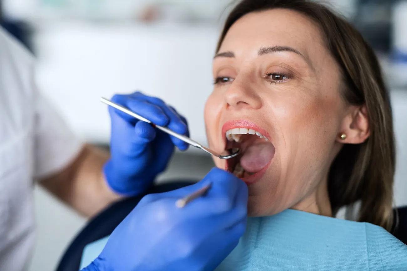 A patient having a dental check-up and cleaning at a Phoenix dental office