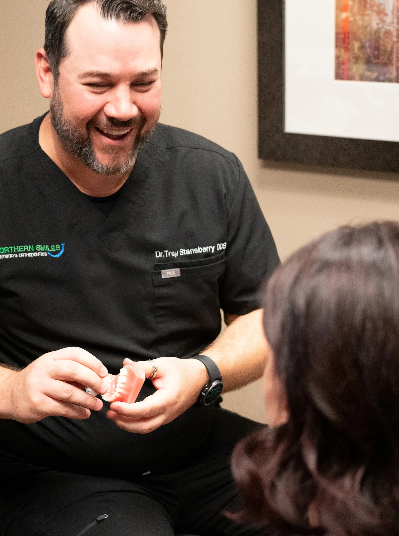 Dr. Troy Stansberry with a patient at Northern Smiles Dentistry
