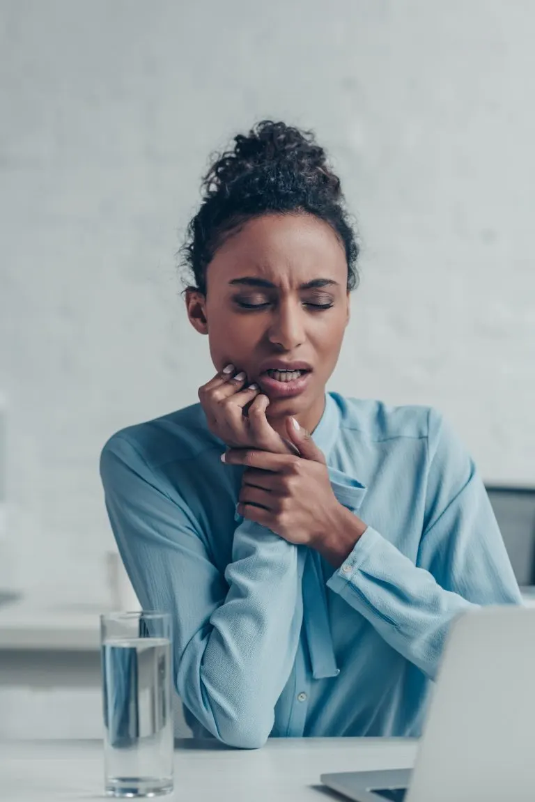 What causes sudden, severe tooth pain?